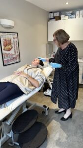 Photodynamic Therapy - Dr Bela Clinic - training with NHS nurse